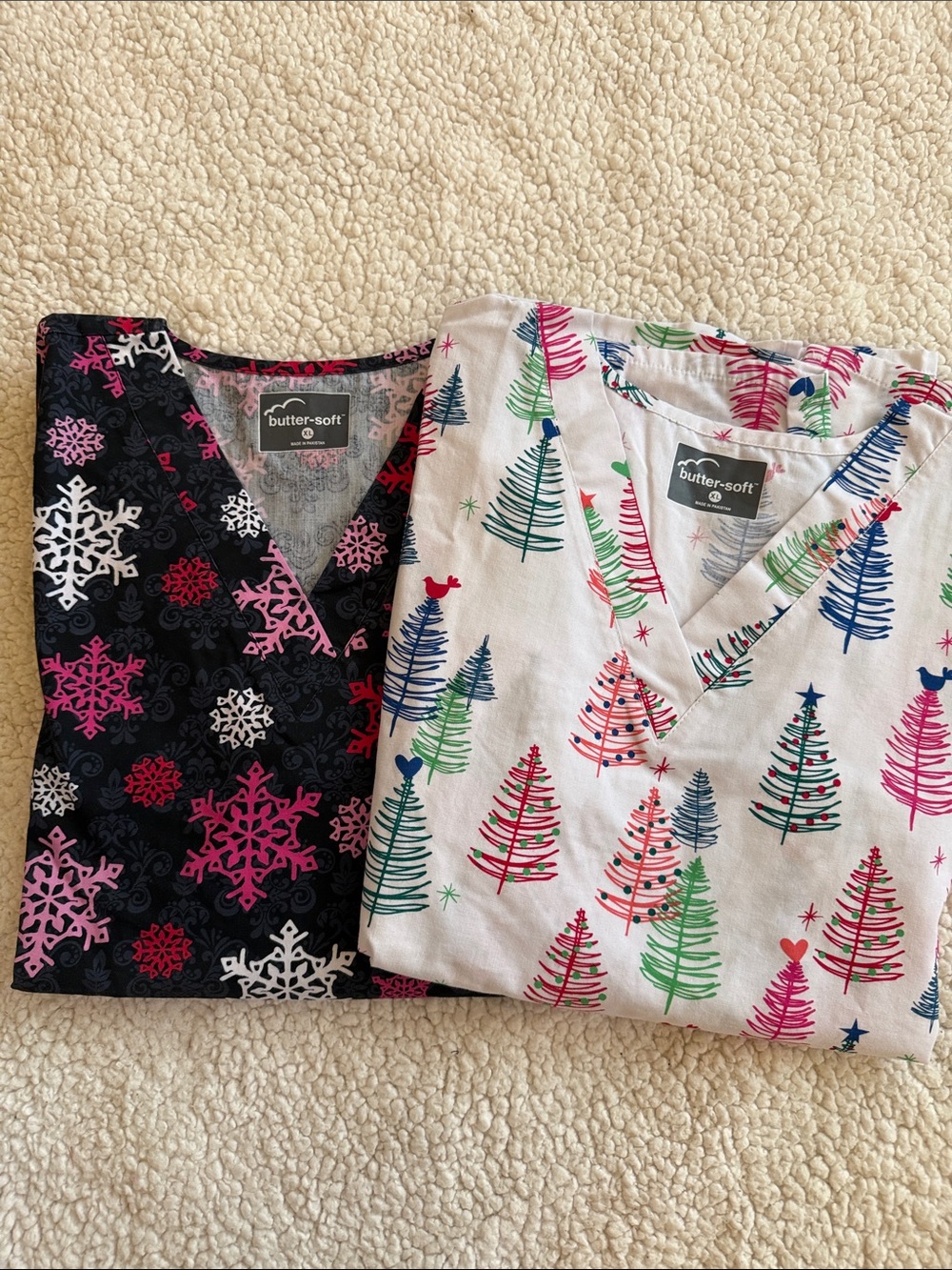 Pair of butter-soft Women’s Holiday Print V-Neck Scrub Top — White & Black